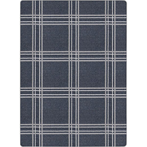 A close-up of a blue and white plaid patterned Joy Carpets area rug.