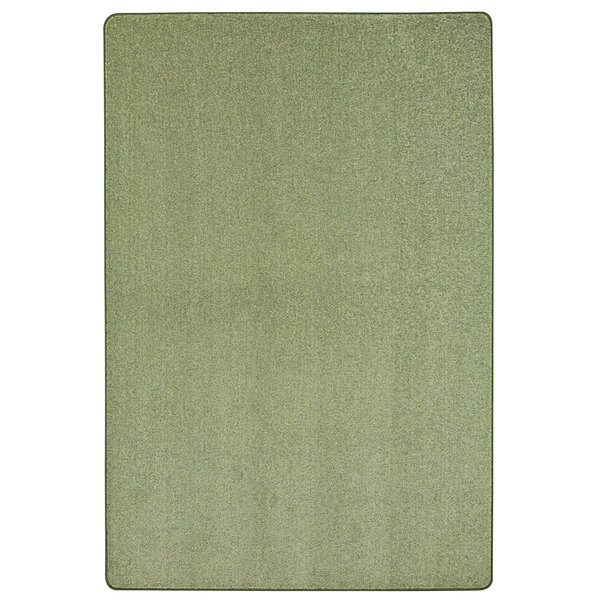 A close-up of a green Joy Carpets rectangle area rug.