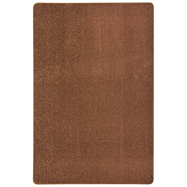 A brown rectangular rug with a white border.