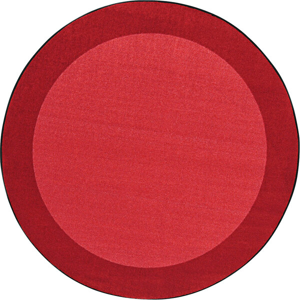 A red circle rug with a black border on a white background.