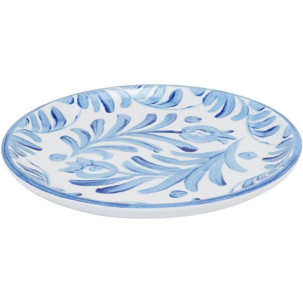 A Cal-Mil Costa melamine plate with a blue and white floral pattern.