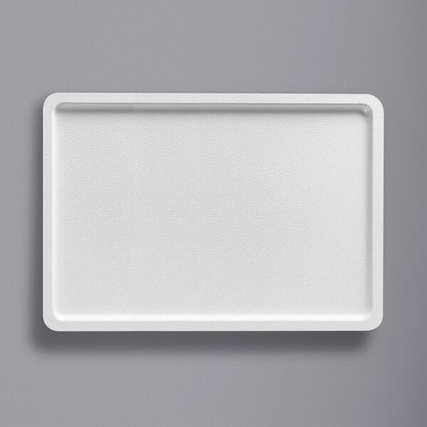 A white rectangular Cal-Mil melamine tray.