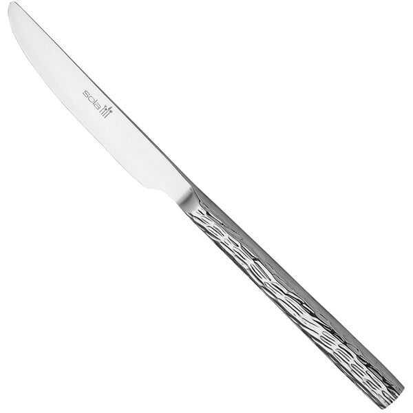 A Sola stainless steel dessert knife with a textured silver handle.