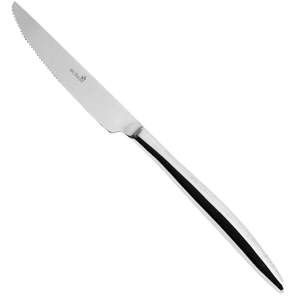 A Sola stainless steel steak knife with a black handle.
