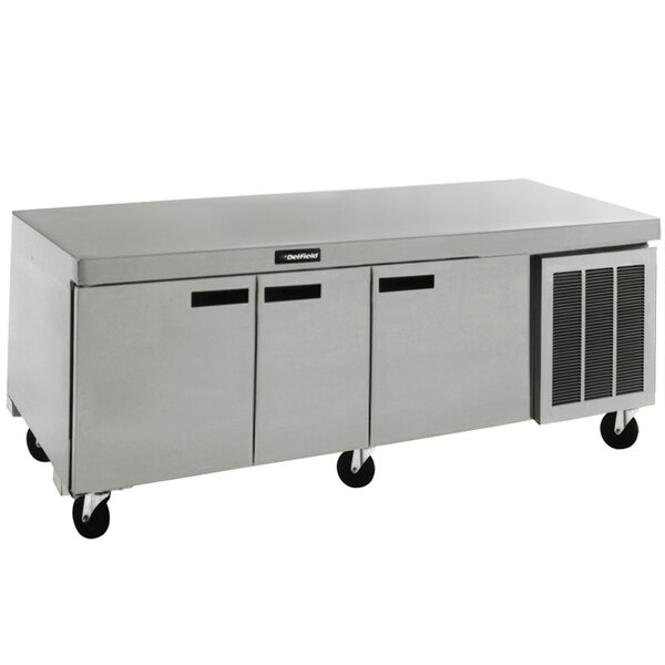 A stainless steel Delfield undercounter refrigerator with two doors and two drawers.