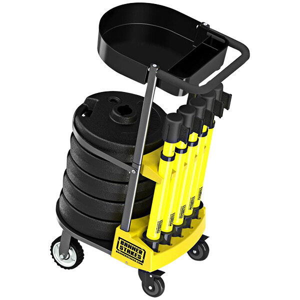 A yellow cart with a Banner Stakes tray and two buckets.