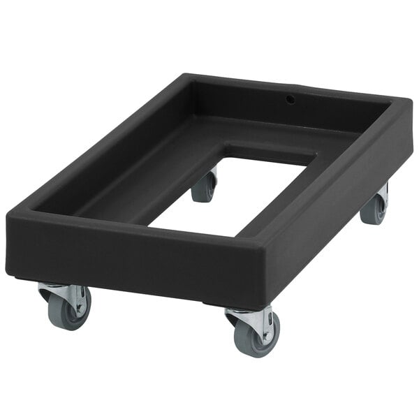 A black rectangular plastic dolly with wheels.