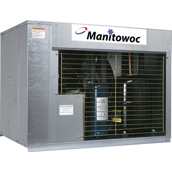 A large grey Manitowoc remote ice machine condenser with yellow mesh on a metal cage.