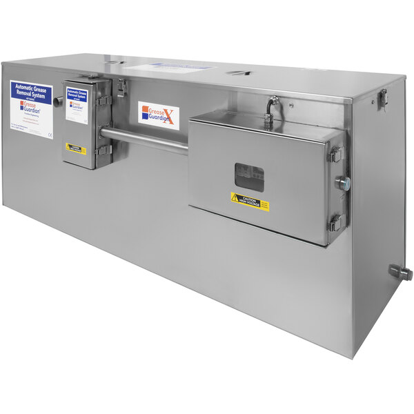 A large rectangular stainless steel Grease Guardian box with two doors.