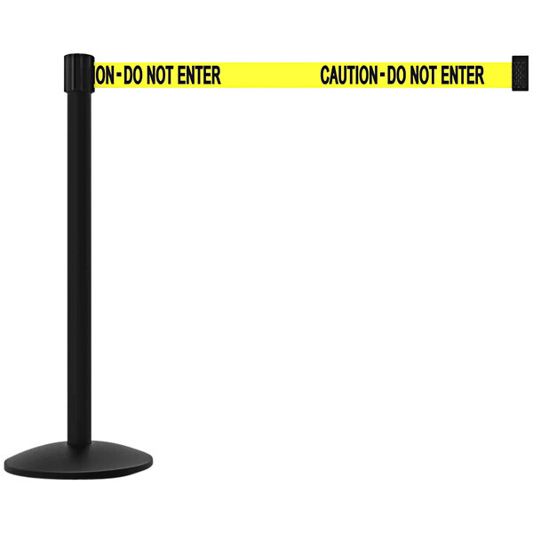 A yellow "Caution - Do Not Enter" banner on a black pole.