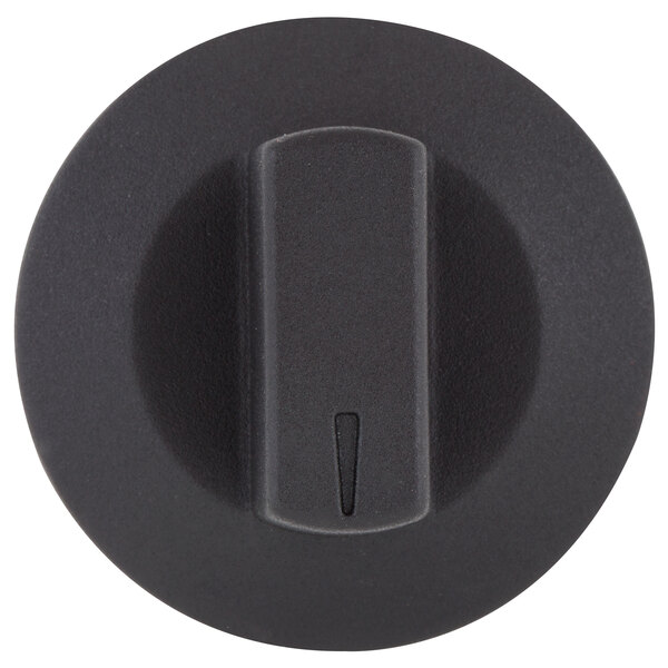 A close up of a black rectangular Carnival King thermostat knob.