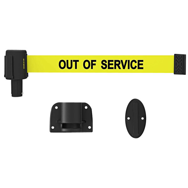 A white wall mount with a black oval object with two holes and yellow and black retractable tape with the words "Out of Service" on it.