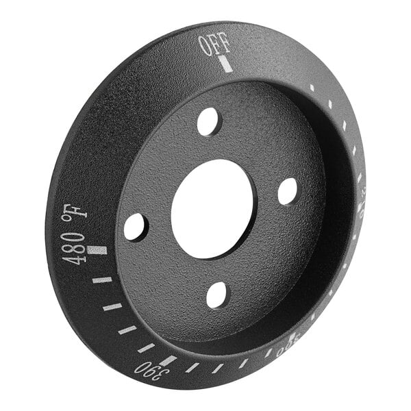 A black round knob with white text on it.