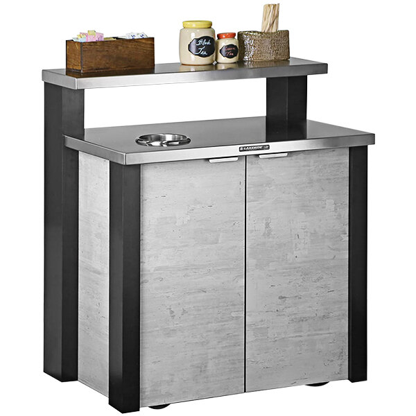A Lakeside stainless steel finishing station kitchen cart with a shelf and food items on top.