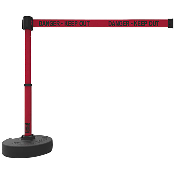 A red and black Banner Stakes retractable barrier with a "Danger-Keep Out" sign.
