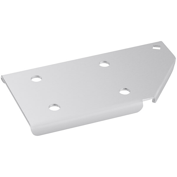 A white metal plate with holes on the bottom right.