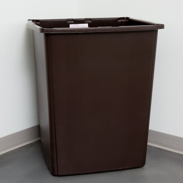 A brown Rubbermaid Glutton outdoor trash can.