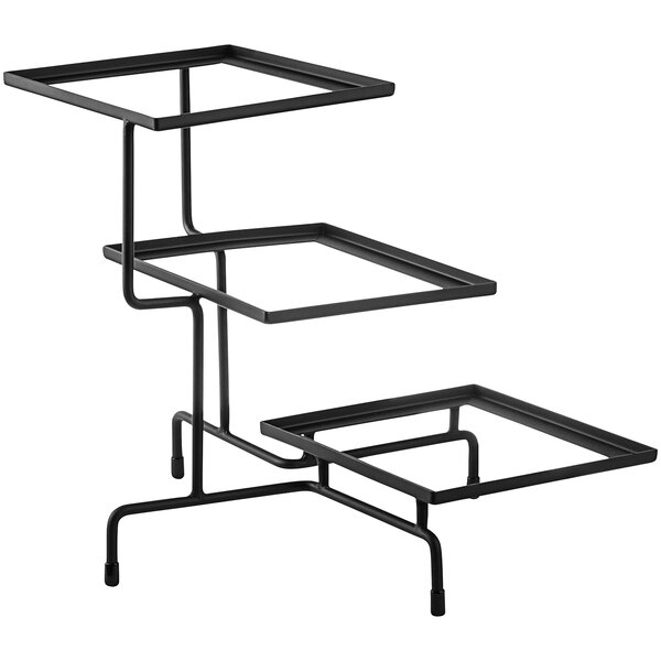 A black metal Tablecraft display stand with three shelves on a table.
