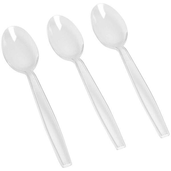 Three Fineline Flairware plastic teaspoons with white handles.