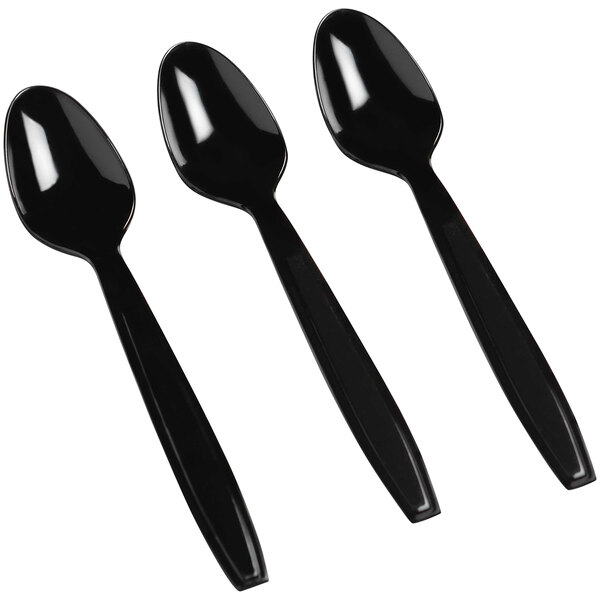 A close-up of three Fineline Flairware black plastic spoons.