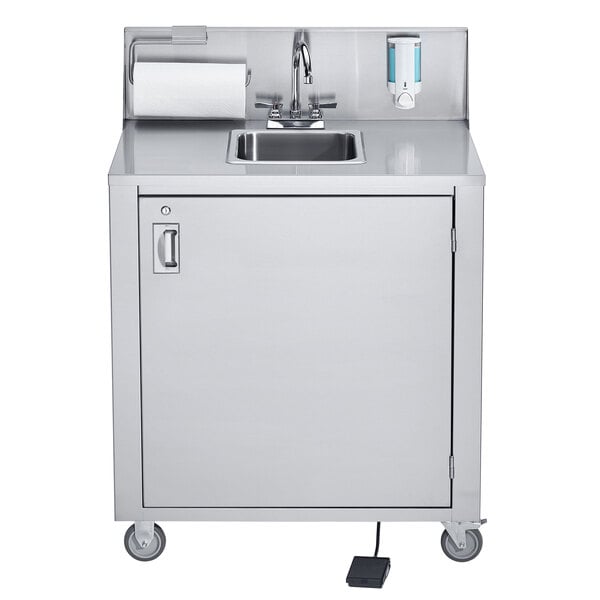 A Crown Verity portable hand sink cart with a towel dispenser.