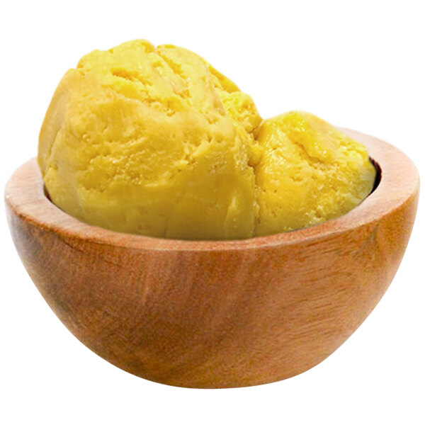 A bowl of G.S. Gelato mango sorbet on a counter.