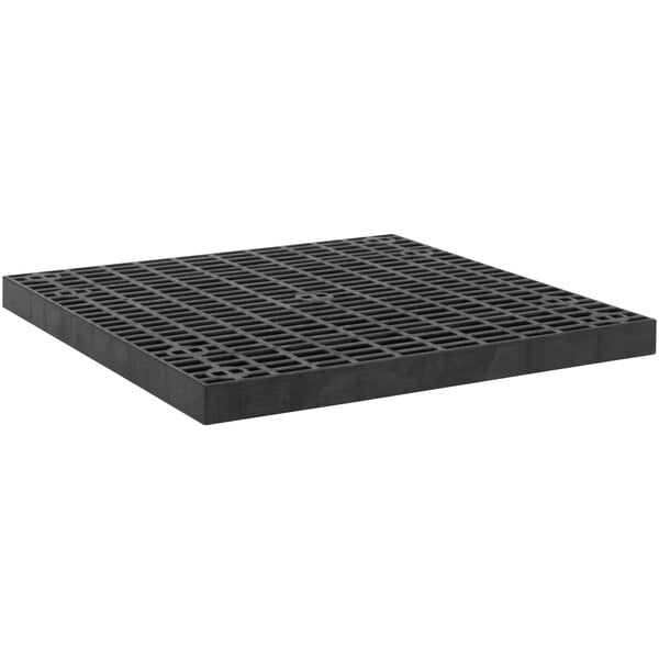 A black square grate with holes.
