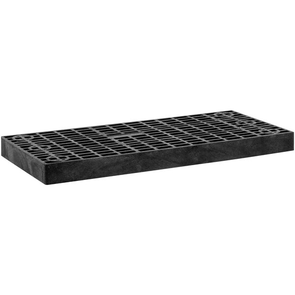 A black rectangular grate with holes.