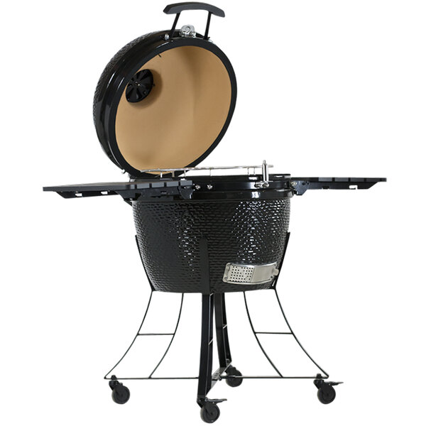 A black round barbecue grill with a lid open.