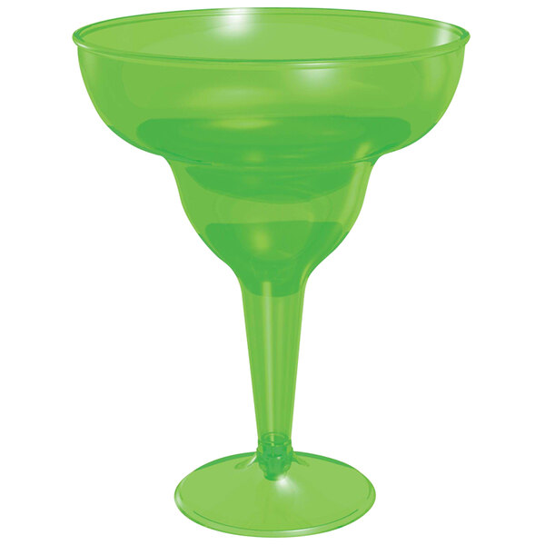 An Amscan green plastic margarita glass with a stem.