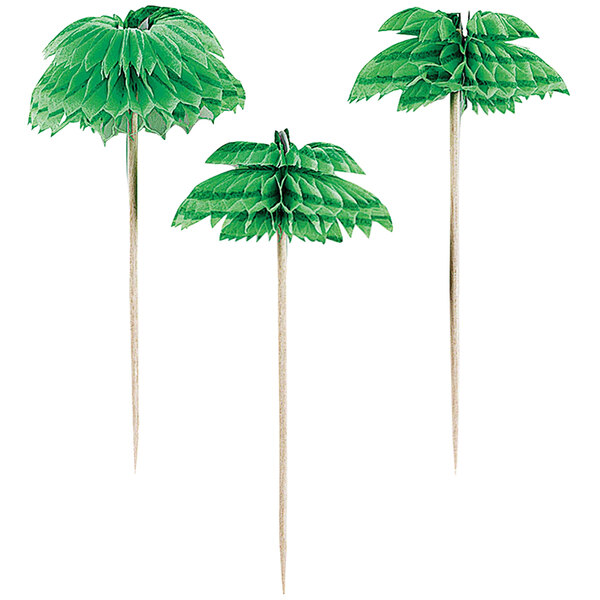 A group of wooden picks with green paper palm trees on top.