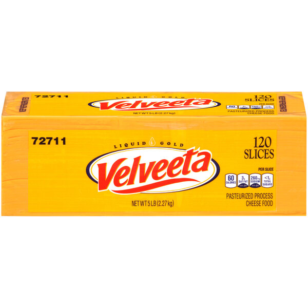 A yellow rectangular Kraft Velveeta box of sliced American cheese.