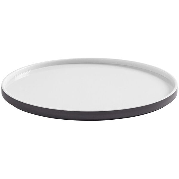 An American Metalcraft Unity 9" melamine plate with a white center and black rim.