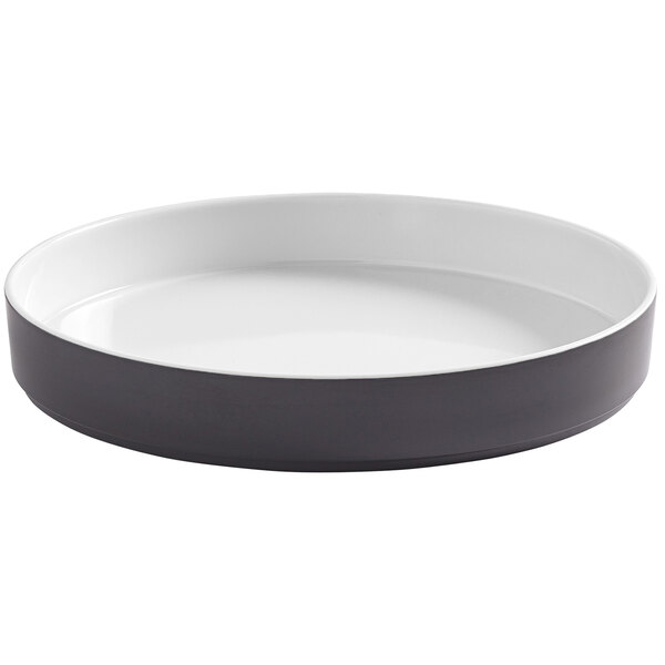 An American Metalcraft melamine bowl with a white interior and black exterior.
