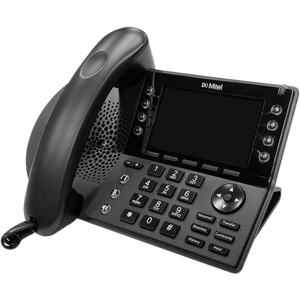 A close-up of a black Mitel corded IP phone.