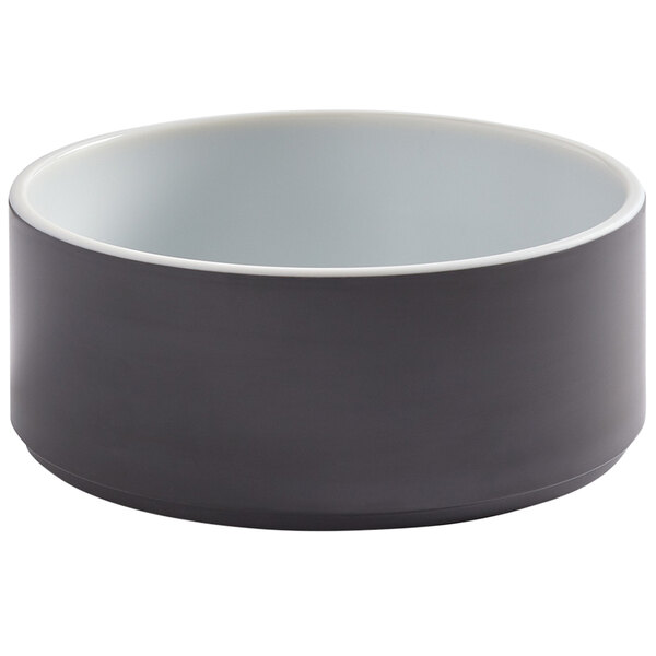 An American Metalcraft melamine bowl with a graphite exterior and white interior and rim.