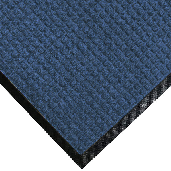 A medium blue WaterHog mat with a black rubber border.