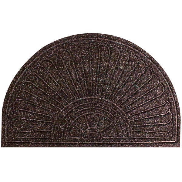 A close-up of the circular design on a brown WaterHog doormat.