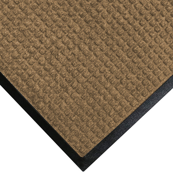 A medium brown WaterHog mat with a black rubber border.