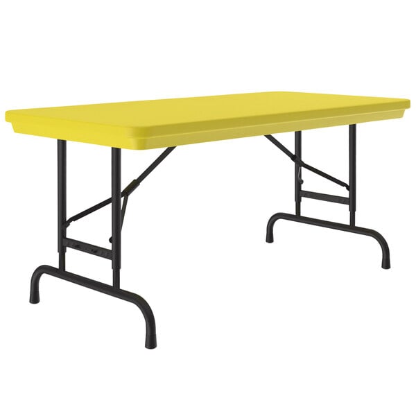 A yellow rectangular Correll folding table with black pedestal legs.