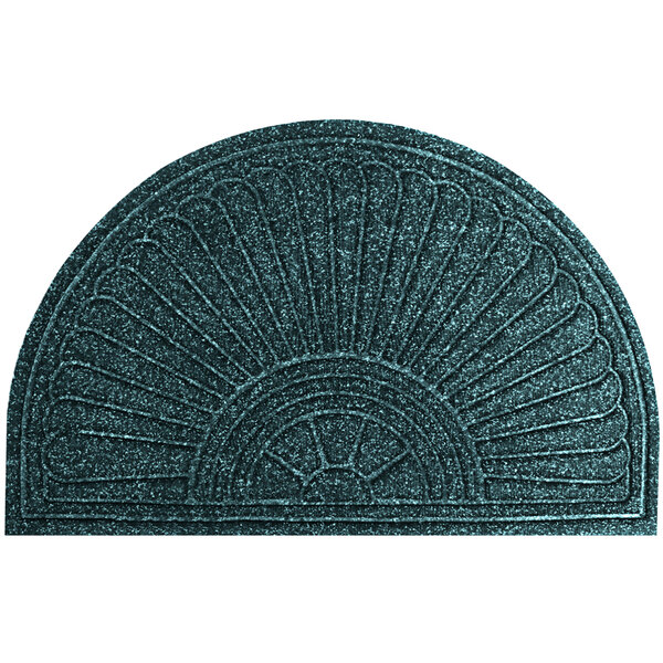 A close-up of a half oval indigo doormat with a circular design.