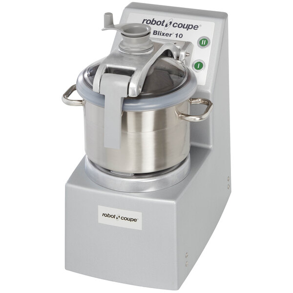 A Robot Coupe stainless steel commercial food processor with a metal bowl on top.