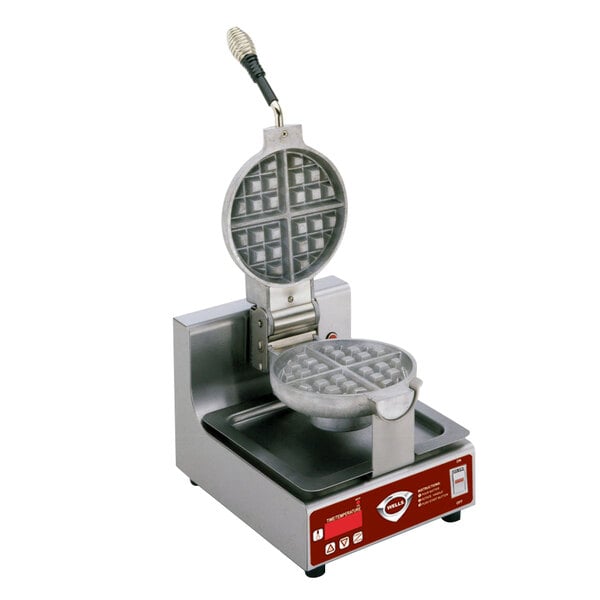 A white Wells Belgian waffle maker with square grids and a lid.