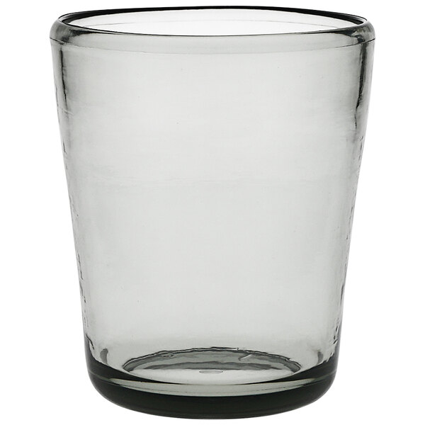 A clear Fortessa Veranda plastic rocks glass with a green tint on a white background.
