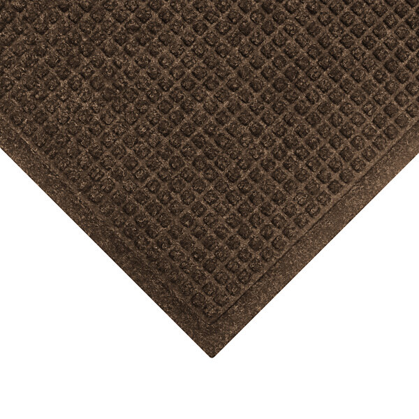 A dark brown WaterHog mat with a square patterned border.
