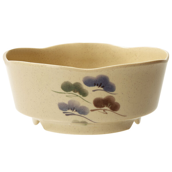 A close-up of a GET Tokyo melamine bowl with a flower design.