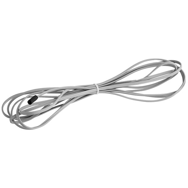 A white temperature probe with a black connector.