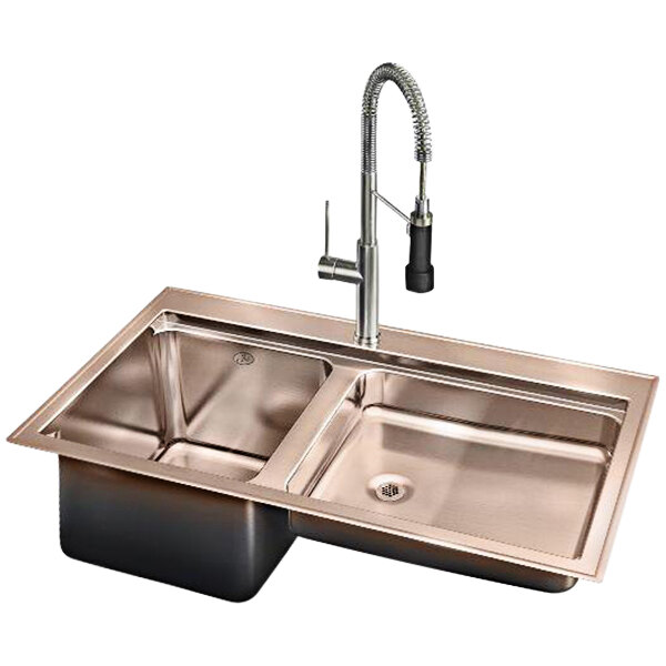 A copper drop-in sink from Just Manufacturing with two shallow compartments and a pre-rinse faucet.