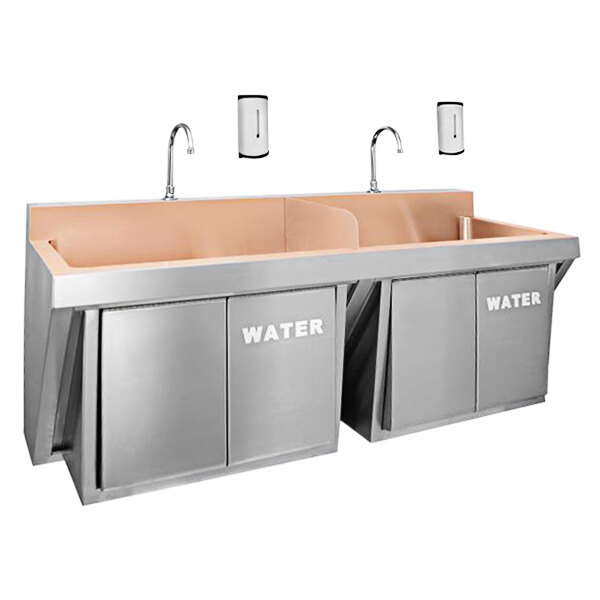A Just Manufacturing copper wall-hung double bowl scrub sink with knee operated faucets over two sinks.