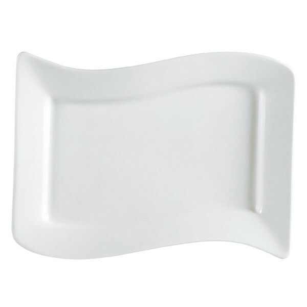 An ivory rectangular stoneware platter with a curved edge.